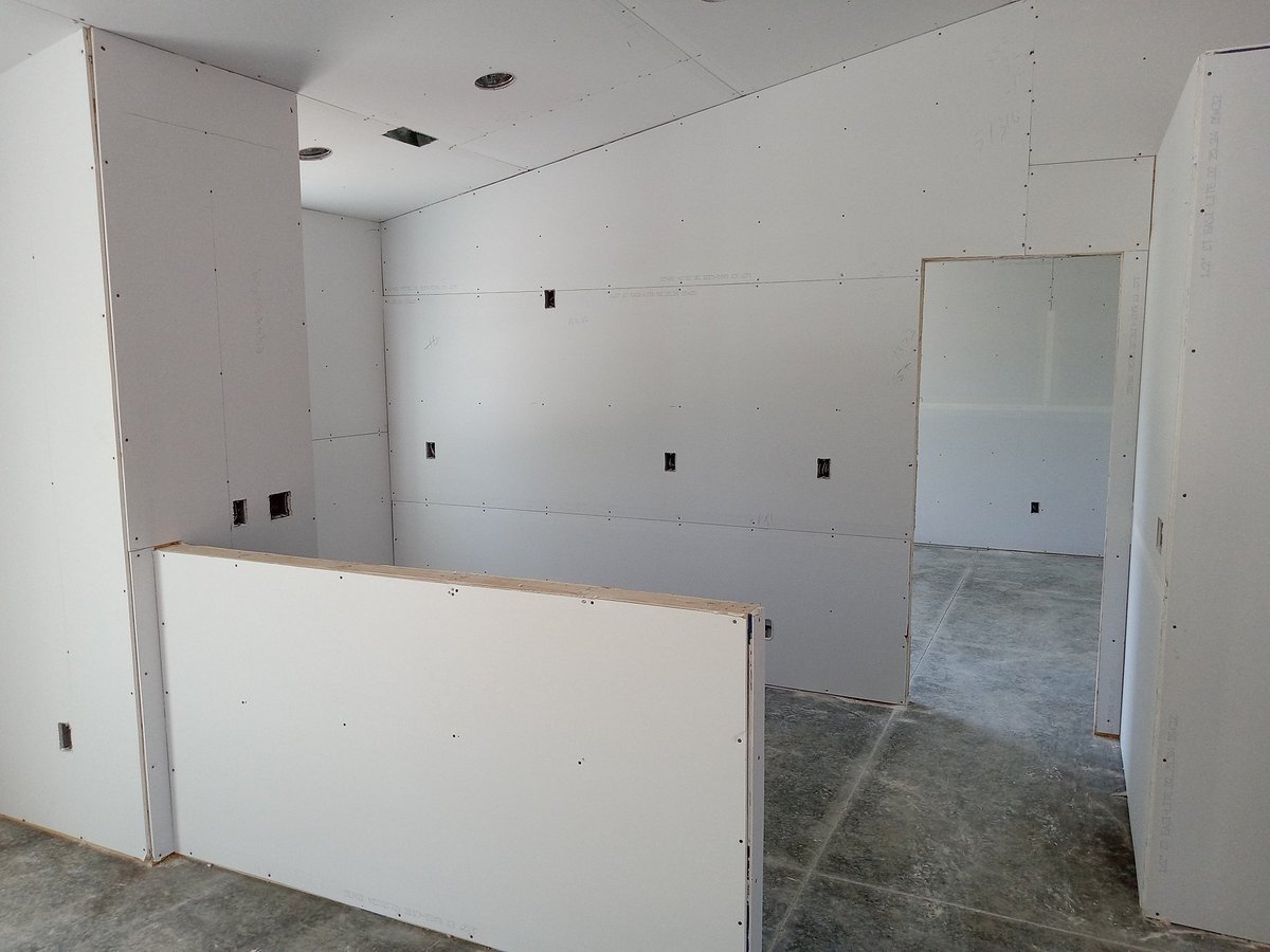 Drywall preparation on a residential job site